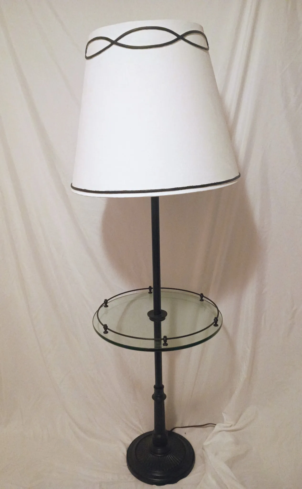 Floor lamp after refinishing: matte black finish with white empire shade and glass side table